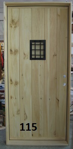 Textured pine stockade door with iron grill