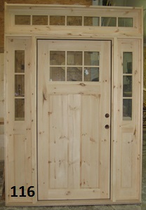 Exterior wood door with matching sidelights and transome