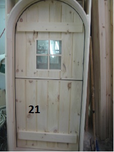 Exterior arch top dutch door with 4 lite window