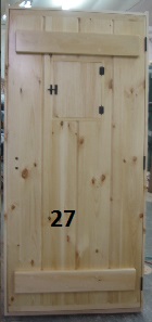 Pine stockade door with rustic speak easy