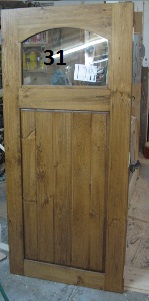Pine door with arched glass