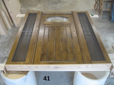 Exterior door with opening sidelights and screens