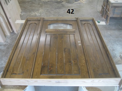 Exterior door unit with matching sidelights and arched glass