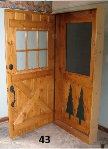 Exterior cross buck stockade door with matching rustic screen door