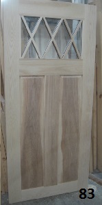 Custom hadwood door with diamond grills