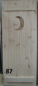 Stockade door with crescent moon cut out